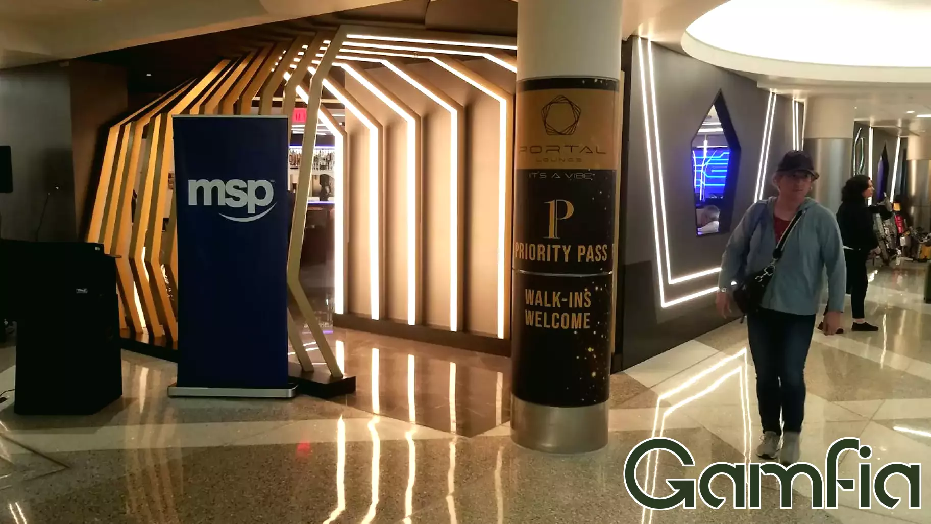 How do you make a new video game lounge at MSP Airport even better? A robot bartender, of course